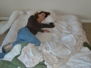 kelli sleeping on our air mattress